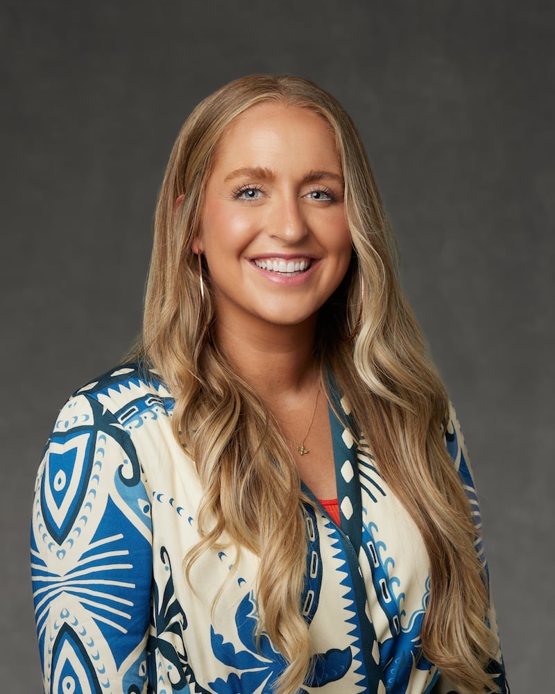 Jordan Murray smiling against a gray backdrop